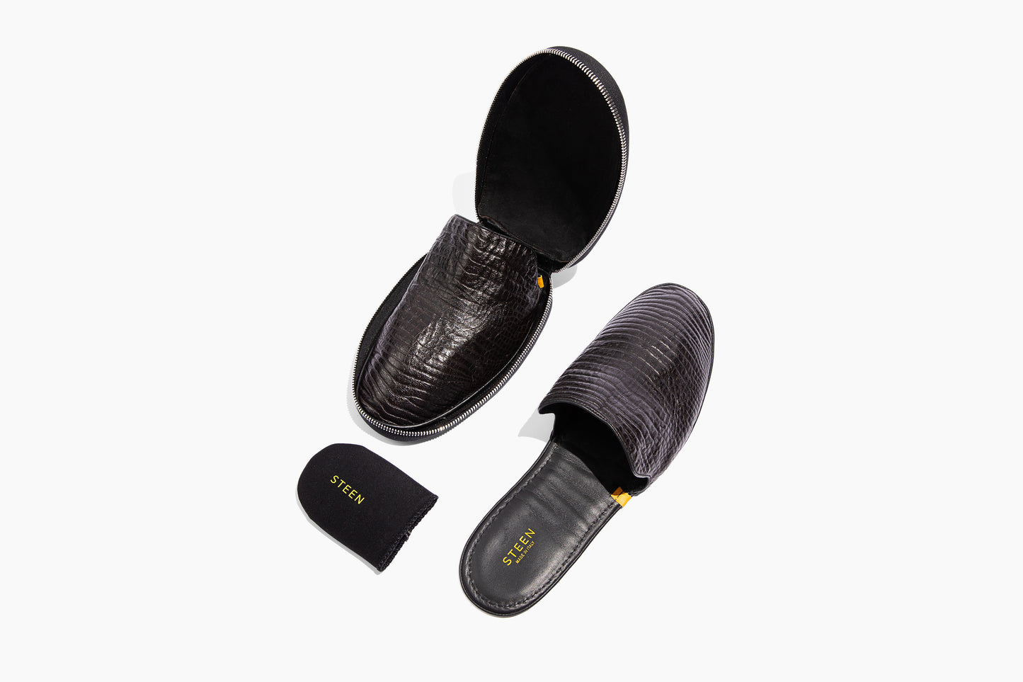 Luxury crocodile embossed leather. Foldable travel slipper. Handmade in Italy.