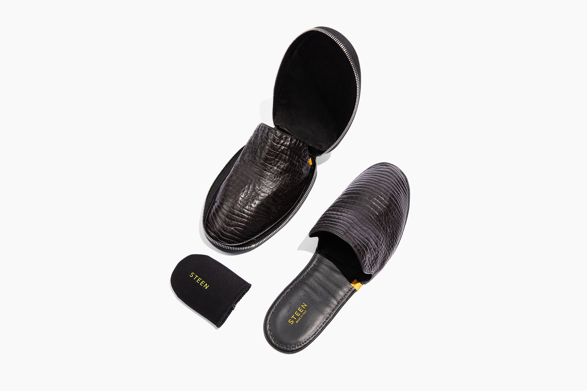 Luxury crocodile embossed leather. Foldable travel slipper. Handmade in Italy.