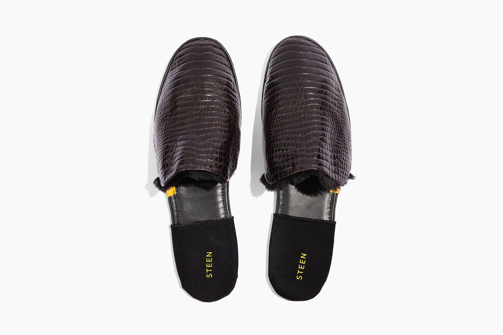 Luxury crocodile embossed leather. Black Eco-fur lining. Foldable travel slipper. Handmade in Italy.