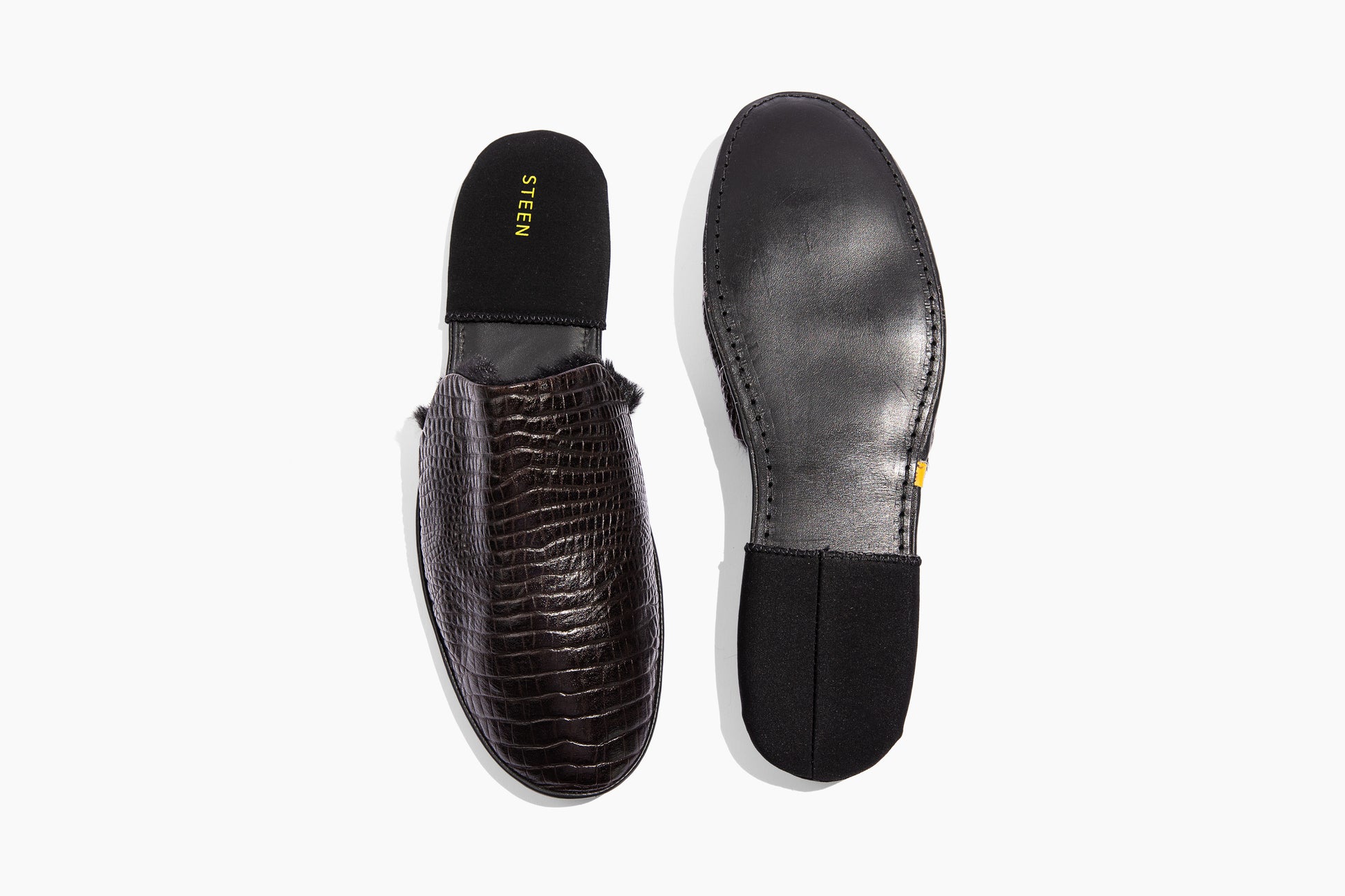 Luxury crocodile embossed leather. Black Eco-fur lining. Foldable travel slipper. Handmade in Italy.