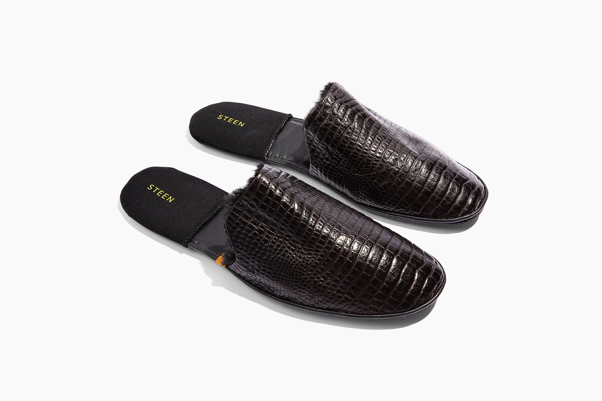 Luxury crocodile embossed leather. Black Eco-fur lining. Foldable travel slipper. Handmade in Italy.